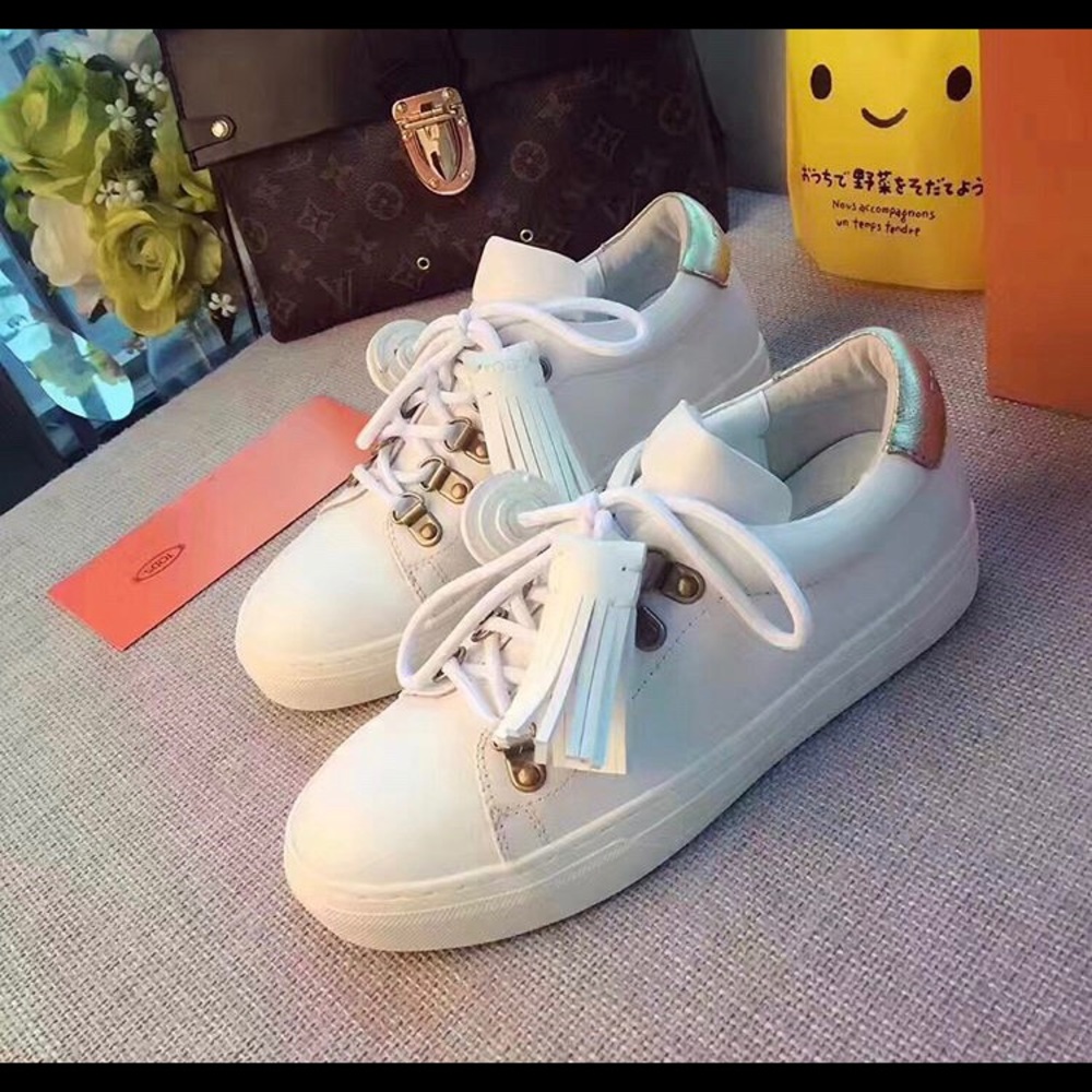 Tod’s Leather White and Gold Sneakers